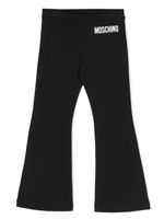 Moschino Kids pantalon évasé à logo imprimé - Noir