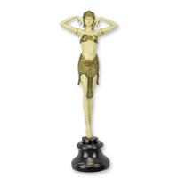 A BRONZE SCULPTURE OF A SCARAB DANCER