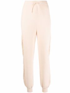 Boutique Moschino pantalon de jogging en maille - Tons neutres