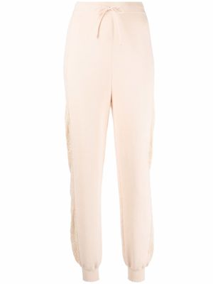 Boutique Moschino pantalon de jogging en maille - Tons neutres
