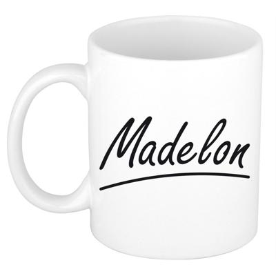 Madelon Naam koffiemok - beker - met sierlijke letters - wit - 300 ml - Cadeau - Dames Madelon Naam koffiemok - beker - met sierlijke letters - wit - 300 ml - Cadeau - Dames