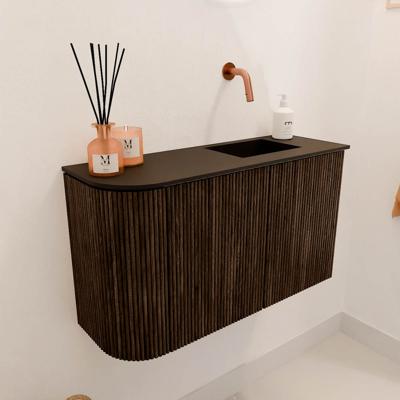 Toiletmeubel Mondiaz Joya | 71.6 cm | Meubelkleur Walnut | Faye wastafel Urban Rechts | Zonder kraangat(en) Toiletmeubel Mondiaz Joya | 71.6 cm | Meubelkleur Walnut | Faye wastafel Urban Rechts | Zonder kraangat(en)