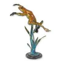A BRONZE SCULPTURE OF A LEAPING FROG