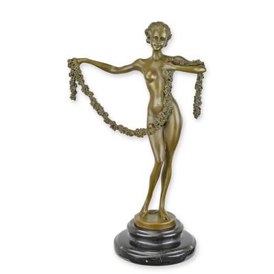 A BRONZE SCULPTURE OF A WOMAN WITH A FLOWER LINE