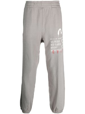 EVISU slogan-print cotton track pants - Grijs