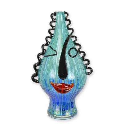 A MURANO STYLE GLASS VASE WITH FISS
