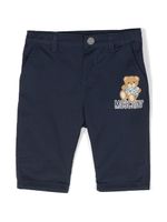 Moschino Kids pantalon chino à logo imprimé - Bleu