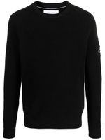 Calvin Klein pull en maille gaufrée à patch logo - Noir