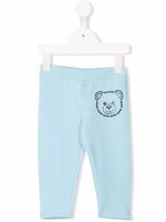 Moschino Kids pantalon de jogging à imprimé Teddy Bear - Bleu