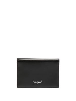 Discord Yohji Yamamoto portefeuille pliant en cuir à logo imprimé - Noir