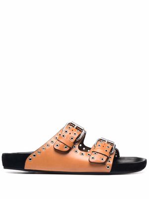 ISABEL MARANT claquettes en cuir à œillets - Tons neutres