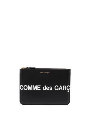 Comme Des Garçons Wallet pochette en cuir à logo imprimé - Noir