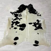 Koeienhuid zwart creme 235x225cm
