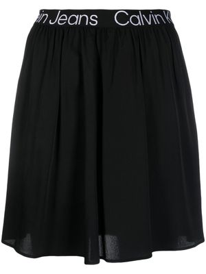 Calvin Klein Jeans jupe mi-longue à taille à logo - Noir