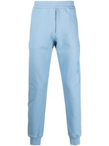 Alexander McQueen pantalon de jogging à logo imprimé - Bleu