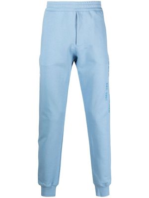 Alexander McQueen pantalon de jogging à logo imprimé - Bleu