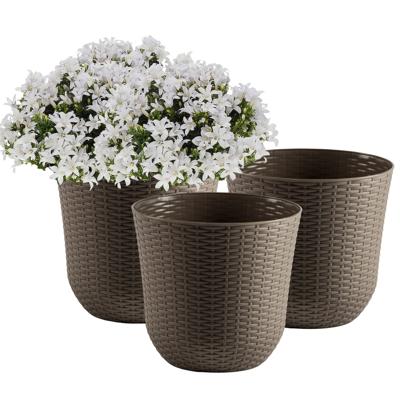 Bloempot/plantenpot - 3x - taupe - kunststof - D32 cm - gevlochten mand look - binnen/buiten gebruik